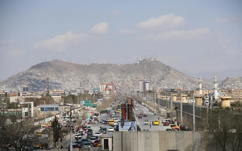 city view with mountains in the background